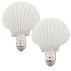 two white scallop shell lights are shown on a white background with clippings