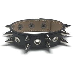 This genuine black leather cuff bracelet is 3/4 inch (18mm) wide by 8 inches long. I have added Round silver eyelet grommets centered down the middle with spike studs down the sides. It has a 3 snap closure which allows it to be adjusted to fit a wrist size from 5 1/2 to 7 1/2 inches around. ----------------------------------------------------- Shortcuts to sections in my shop ----------------------------------------------------- View my homepage: https://www.etsy.com/shop/SimplyRozi 8mm wristba Spike Cuffs, Black Leather Cuff Bracelet, Leather Wrist Cuff, Spike Bracelet, Studs And Spikes, Eyelets & Grommets, Gothic Bracelet, Genuine Leather Bracelet, Studs Men