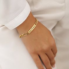 Celebrate the unique connection between friends with our Personalized 18K Gold Plated Bracelet. Featuring elegant engravings of names and meaningful symbols, this bracelet symbolizes the bond shared and is a stylish accessory for everyday wear. Size: Designed for a comfortable fit, with detailed sizing available in our infographic guide. Material: Premium quality 18K gold plated over sturdy stainless steel for lasting wear. Durability: Constructed to be waterproof and hypoallergenic, ideal for s Minimalist Engraved Bracelets For Friendship, Trendy Gold Name Bracelet For Friendship, Personalized Yellow Gold Friendship Bracelets, Trendy Gold Friendship Name Bracelet, Elegant Gold Name Bracelet For Friendship, Trendy Gold Friendship Bracelet, Elegant Engraved Jewelry For Friendship, Minimalist Engraved Name Bangle Bracelet, Rectangular Engraved Gold Bracelet Gift