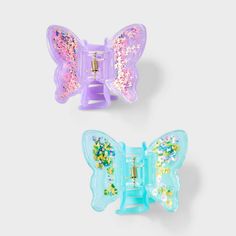 Style your little one's hair with the Girls' 2pk Shaker Butterflies Claw Set from Cat & Jack™ Purple/Blue. Designed for all hair types, this set of 2 claw clips allows for easily securing your little one's hair on-the-go. Ideal for creating cute looks, these clips add a touch of fun with their butterfly designs with sequins inside. Cat & Jack™: Designed for all children so you can trust it's made for yours. Hair Twisters, Inside Cat, Butterfly Designs, Cute Looks, Cat Ears Headband, Hair Accessories Set, Heart Themed, Barbie Party, Cute Butterfly