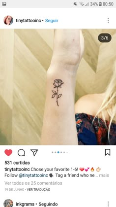 a woman's wrist with a small rose tattoo on the left side of her arm