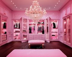 a pink closet with chandelier, bench and shoes on the floor in front of it