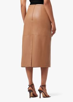 With subtle seam details on lush faux leather, the Doreen midi is your ‘up for anything’ skirt. Tuck in a turtleneck or crisp button down for a modern, yet classic look, throw on a tee and jean jacket for a more casual vibe, or add a shimmery top to this fawn-colored skirt for a stunning Friday night feel.We create unique and special products. Due to the nature of vegan leather, color from other surfaces or garments may absorb or transfer onto this fabric. Please ensure garments are stored separate from dark colors to avoid color absorption and/or transfer.
28 3/4" RISE100% Vegan LeatherMODEL IS WEARING SIZE SMALL 28 3/4" front rise 30" back rise 21 1/2" leg opening Vegan Leather Skirt, Plaid Coat, Faux Leather Skirt, Fitted Skirt, Autumn Fashion Women, Leather Wraps, Womens Fall, Denim Fabric, S Models