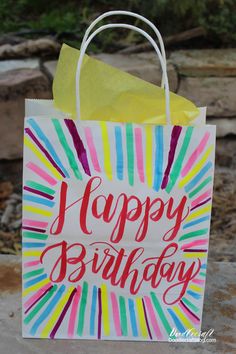 a paper bag with the words happy birthday on it