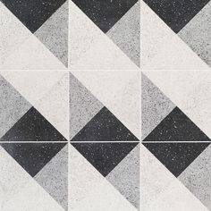 black and white tiles with different designs on them