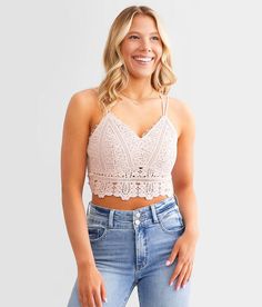 BKEssentials Crochet Lace Bralette - Pink X-Small, Women's Rosesmoke Strappy lined stretch bralette Smocked back Adjustable straps Bust measures 26 on size small Body length up to 16 on size small. Trim: 100% Cotton. Contrast: 100% Rayon. Lining: 100% Polyester. Hand wash cold. Do not bleach. Lay flat to dry. Do not iron.. Measurements: Bust -Fullest part of bust with arms at sides. Waist -Circumference of natural waist: above belly button below rib cage. Hips -Standing with feet together fulles Spring Fitted Bra-friendly Crochet Top, Spring Fitted Crochet Top Bra Friendly, Pink Lace Bralette, Waist Circumference, Rib Cage, Lace Bralette, Belly Button, Crochet Lace, Lay Flat