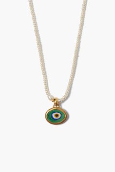 A necklace of petite freshwater rice pearls with a striking green hand-rolled clay evil eye pendant is a playful take on this classic symbol of protection. A dainty piece to layer or style solo. 18k gold plated sterling silver, freshwater pearls, clay evil eye charm. 16 - 18" adjustable. Handmade in Vietnam. Beaded Jewelry With Charms, Dainty Necklace Stack, Clay Necklace Pendant, Gold Evil Eye Jewelry, Olive Necklace, Layer Necklaces, Necklaces Layered, Fantasy Earrings, Rice Pearls