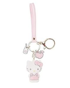 a pink hello kitty keychain hanging from a hook