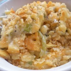 a close up of a bowl of food with broccoli and cauliflower