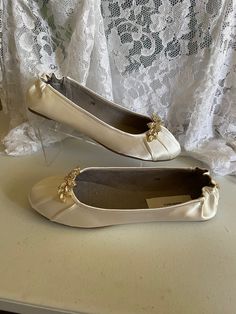 "Dressy White Satin Flats for Brides! US Sizes: 5 to 10, and 11 Regular width. (I might be sold out of a few sizes) Shoes run true to size; I always suggest to verify your shoes size by measuring your feet length; I have a simple measuring guide i can send if, you feel your shoes size sometimes an issue; specially because shoes can not be returned, or exchanged. Outside USA, please goggle a shoe size chart convertor or contact me for help. Shoe style description: Beautiful, Delicate and comforta Elegant Pearl Embellished Flats For Formal Occasions, Elegant Pearl-embellished Formal Flats, Elegant Pearl Embellished Formal Flats, Elegant Embellished Ballet Flats For Formal Occasions, Elegant Embellished Slip-on Flats, Elegant Cream Flats For Party, Elegant Round Toe Ballet Flats For Wedding, Elegant Wedding Ballet Flats With Round Toe, Elegant Flat Wedding Shoes With Rhinestones