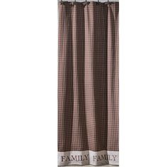 a brown and white checkered shower curtain with the word family on it's side