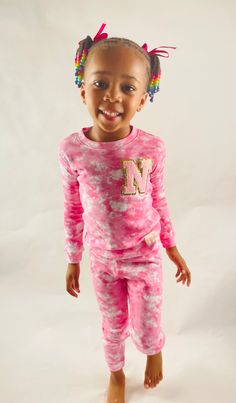 Are you looking for the perfect personalized gift for a special little one in your life? Look no further than these adorable pajamas!These tie dye pajamas are soft and comfortable. They're perfect for lounging around the house or getting a cozy night's rest and of course, they're stylish too. The tie dye design is sure to standout.Whether you're looking for a gift for a birthday or holiday or just want to treat your little one to something special, these pajamas are sure to please. Order your cu Adorable Pajamas, Pajamas For Girls, Pink Tye Dye, Girls Pjs, Personalized Pajamas, Toddler Pajamas, Pajamas Gift, Harry Styles Wallpaper