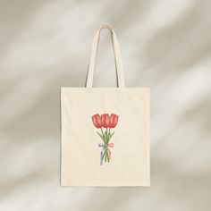 This handcrafted tulip bouquet canvas tote bag is perfect for every occasion. From days at the beach, to afternoons at the park, this shoulder bag can bring some american summer vibes to your everyday life.  Elite Quality: This 100% cotton tote bag comes made from durable, eco-friendly materials. All ink used for the designs is water-based, biodegradable, and non-toxic. These double stitched seams and sturdy handles help ensure that this tote bag is ready for the tasks of everyday life.  ✨Versat Tote Bag Christian, Pink Flower Bouquet, Christian Tote Bags, American Summer, Canvas Flats, Bag Flower, Tulip Bouquet, Cotton Tote Bag, Tote Bag Design