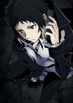 an anime character holding a cell phone up to his ear and looking at the camera