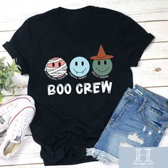 ✔️ NAME: Boo Crew Teacher Unisex T-Shirt, Halloween School Shirt, Teacher Shirt, Halloween Gift, Trick Or Treat Shirt, Ghost Shirt ✔️ IMPORTANT NOTE: Both Men and Women can we our shirts because this is unisex style t-shirts; Wash item inside out in cold water, do not bleach, do not dry clean, do not iron directly on the design. ✔️ MATERIAL: 5.3-ounce, 100% cotton (99/1 cotton/poly (Ash) & 90/10 cotton/poly (Sport Grey); Heavyweight classic unisex tee; Taped neck and shoulders; Tearaway label; Decoration type: Digital Print ✔️ OUR DESIGN PRODUCTS: Each One are designed and sold in limited quantities. The designs are created by our incredibly talented in house graphic art team who often hand draw and illustrate each Tee shirt design. ✔️ SIZE CHART: Please refer the attached size chart to ch Spooky Black T-shirt With Funny Print, Black Spooky T-shirt With Funny Print, Novelty Black T-shirt With Character Print, Funny Black T-shirt With Character Print, Cute Black T-shirt With Funny Text, Funny Black Tops With Character Print, Black Novelty T-shirt With Character Print, Black Cartoon Print Shirt For Halloween, Black Novelty Short Sleeve Tops