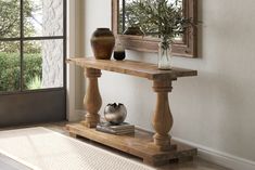 Pictured in Harvest Wheat Finish. Pictured with the <a href=/products/sanibel-natural>Sanibel Natural Rug</a>. Built In Console Table, Pedestal Console Table, Real Living Room, Small Foyer Ideas, Live Edge Bed, Singapore House, Entry Hall Table, Table For 12, Small Foyer