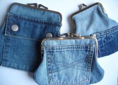 two small denim purses sitting on top of each other