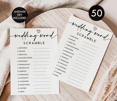 two wedding word scramble cards on a table