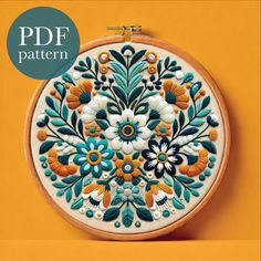 an embroidery pattern is shown on the cover of a magazine