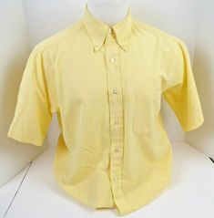 Vintage Redwood & Ross by Hathaway Mens Button Up Shirt Yellow Short Sleeve 1950-60's 65% Dacron Polyester - 35% Cotton Durable Press One Pocket has and Exclusive Club Tailoring label on bottom of shirt where a name can be printed(see Photo) Button Down Collar Underarm to underarm - 24" Length from bottom of back collar to hem - 24"  Club Tapered pre-owned, very nice vintage condition, no stains or tears, does have numbers stamped in the inside collar (see photo), does not have size tag, please Yellow Button Up Shirt Outfit Men, Classic Short Sleeve Business Shirt, Formal Yellow Cotton Shirt, Classic Formal Button-up Short Sleeve Shirt, Classic Short Sleeve Shirt With Button Closure, Classic Collared Short Sleeve Shirt For Formal Occasions, Classic Cotton Short Sleeve Shirt, Classic Button-up Short Sleeve Shirt, Classic Cotton Formal Short Sleeve Shirt