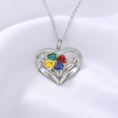 Treat yourself and your best friends to a bold, beautiful necklace that is truly one of a kind! Our Personalized Sterling Silver Wings and Hearts Necklace - 4 Custom Names 4 Birthstones is the perfect gifting option that complements your unique style perfectly, Handcrafted with the best quality stainless steel, this necklace is no doubt durable and long-lasting. Carefully crafted with stainless steel, this necklace is definitely worth investing in as it is durable and long-lasting. With regular Multicolor Heart Pendant Necklace For Gift, Customizable Heart-shaped Necklace For Birthday, Customizable Heart Necklace For Birthday Gift, Multicolor Heart Charm Necklace For Mother's Day, Customizable Heart Pendant Jewelry For Birthday, Multicolor Heart-shaped Birthstone Jewelry, Multicolor Heart Cut Necklace Gift, Multicolor Heart Cut Necklace For Gift, Multicolor Heart Pendant Jewelry For Gift