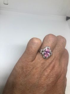 Vintage white and pink CZ ring 925 Sterling Silver Setting Size 7 Can be resized, my jeweler charges $10-$20 All rings are shipped free in the US in a nice gift box. Check out our over a THOUSAND great reviews Engraving is $4 per letter and is not always perfect depending on the piece. It can take a few days if the jeweler is busy. This is payable to Paypal Judithsltd@gmail.com Pink Sterling Silver Crystal Open Ring, Pink Sterling Silver Crystal Ring With Gem, Formal Pink Sterling Silver Diamond Ring, Elegant Pink Sterling Silver Rings, Silver Ring For Formal Occasions And Mother's Day, Silver Ring For Formal Occasions On Mother's Day, Pink Birthstone Ring As A Gift, Valentine's Day Pink Sterling Silver Birthstone Ring, Pink Sterling Silver Crystal Ring For Formal Occasions