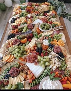 a long table filled with lots of different types of food