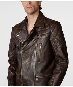 Men's Distressed Biker Leather Jacket In Dark Brown The men's distressed biker leather jacket is the epitome of rugged elegance. Crafted with semi-aniline sheepskin leather, it features a unique quilted shoulder design and a vintage look. This jacket offers a turn-down collar, zip cuffs, and a smooth zipper closure for a secure fit. Inside, it's lined with soft viscose and equipped with practical pockets, including two side and two breast zip pockets, for ultimate functionality and style. Outer Rugged Leather Biker Jacket For Motorcycling, Rugged Leather Motorcycle Jacket, Distressed Brown Moto Leather Jacket For Biker Events, Rugged Leather Biker Jacket, Rugged Leather Outerwear For Biker Events, Moto Style Distressed Brown Leather Jacket, Distressed Leather Biker Jacket For Biker Events, Distressed Brown Leather Jacket For Biker Events, Moto Biker Jacket In Distressed Brown For Biker Events