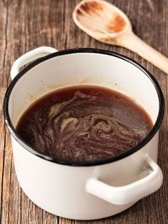 an easy brown gravy recipe in a white mug