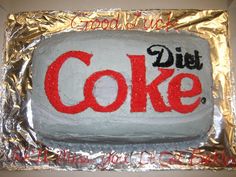 a cake made to look like it has the word diet coke on it