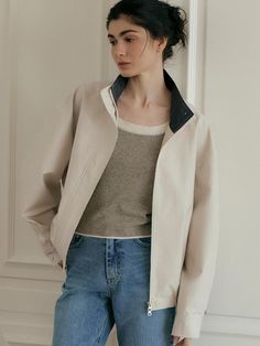 Soft and structured, this oversized blouson jacket features high neckline and two way hidden zip fastenings for casual mood. Layer yours over various itmes for comfortable, daily mood. - Cotton and nylon blend fabric- Lightweight, crisp texture- Semi cropped silhouette- Color-trimmed detail at inner neckline and back- Wide banded hem design Oversized Turtleneck Outerwear For Spring, Everyday Fall Turtleneck Outerwear, Beige Turtleneck Outerwear For Work, Blouson Jacket, Semi Cropped, Daily Mood, Casual Coat, Cotton Blouses, Casual Jacket