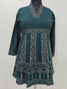 Short Kurta For Women/ Tunic Dresses - T-shirt For Women / Cotton Kurti Embroidery Tunic Kurta / Indian Short Kurti / Ethnic Kurti For Women Product Description Teal Green  Embroidery  Printed  Tunic Kurta Neck Type : V Neck 3/4 Sleeves Easy to Carry In Summer Material and Care Viscose Rayon Cotton Hand wash, Machine wash Items includes One piece Kurta Note:- Please see the size chart in the image to choose a perfect size. Please feel free to ask any questions regarding this item WE ALSO ACCEPT CUSTOMISATION AS PER CUSTOMER REQUESTS. Bohemian Straight Kurta Top With Resham Embroidery, Bohemian Tops With Resham Embroidery Straight Kurta, Festive Digital Print Tunic Kurta, Festive Tunic-shaped Kurta With Resham Embroidery, Festival Printed Tunic Kurta, Ethnic Kurti, Womens Tunic Dress, Short Kurti, Embroidery On Kurtis