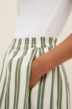 An easy-wear pant, made from organic cotton poplin shirting. The Athena Pant is a full-length version of Kowtow's widely-loved culottes. It has an effortless wide leg silhouette and a relaxed fit. It features a high-rise, elasticated waist, and has inseam pockets and pleats. All Fairtrade organic cotton. All plastic-free. Sizing: This style is designed to sit at your true waist with a relaxed fit. The Body Book, Luxe Life, Japan Design, Denim Design, Mens Accessories Fashion, Shirt Skirt, Skirts For Sale, Easy Wear, Cotton Poplin