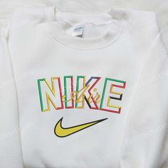 Colorful Nike Air Inspired Embroidered Shirt, Unique Embroidered Shirt Tinicloset is an exceptional online store that offers a wide range of embroidered apparel, including sweatshirts, t-shirts, and hoodies. With a vibrant collection that caters to individuals seeking unique and stylish clothing options, Tinicloset takes pride in its colorful Nike Air inspired embroidered shirts, showcasing a fusion of fashion-forward designs and high-quality craftsmanship. One of the standout offerings at Tinic Colorful Nike, Nike Air Logo, Air Logo, Embroidered Apparel, Maroon Hoodie, Embroidered Shirts, 3d Shirt, Custom Nikes, Embroidered Clothes