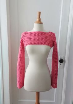 Crochet Shrug In Your Color. On trend for 2024, the crochet shrug is great for when you're just cold enough to need something on your arms. In your choice of color, adult size S/M.  Free shipping! Dimensions: (unstretched) Bust 32", sleeves 21.5" long.  Thank you for visiting YellowRoseRetail.com! Stretch Pink Crochet Top, Stretch Crochet Top In Pink, Fitted Hand Knitted Crochet Top For Winter, Fitted Crochet Shrug For Spring, Fitted Winter Crochet Top, Pink Fitted Crochet Top For Fall, Fitted Winter Crochet Top With Knit Fabrication, Fitted Pink Crochet Top For Fall, Fitted Crochet Top For Winter