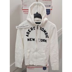 NEW ABERCROMBIE & FITCH MENS EAST RIVER TRAIL HOODIE SWEATSHIRTS WHITE  MEDIUM-LARGE NEW WITH TAG 100% Authentic Guarantee Buyer note: Some ABERCROMBIE & FITCH hoodies jacket is Hand-done destruction, Vintage Abercrombie Wash, Most Hoodies look like damaged, but that's their style, If you can't accept, please don't buy.  MENS TOPS                   A&F CHEST (IN) ARM (IN) EU UK KOREA CHINA XS 34 - 36 32 86 - 91 81 90 165/84A S 36 - 38 32.5 - 33.5 91 - 96 82 - 85 95 170/92A M 38 - 40 34 - 34.5 96 White Cotton Hoodie With Logo Detail, White Cotton Hoodie With Logo, White Hoodie With Logo Detail For Spring, White Logo Hoodie For Spring, White Logo Sweatshirt For Winter, White Long Sleeve Hoodie With Logo, White Streetwear Hoodie With Logo, White Logo Hoodie For Fall, White Crew Neck Hoodie With Logo Detail