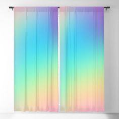 a window curtain with an abstract rainbow background