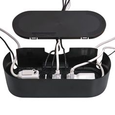 an electronic device is connected to two wires and plugs in the back of it