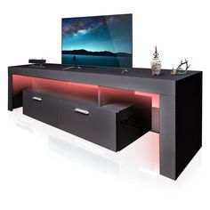 a flat screen tv sitting on top of a black entertainment center