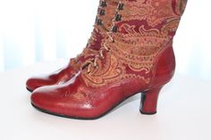 "I CAN DO THIS COMBINATION OF 2 LEATHERS/FABRICS IN ANY COLOUR YOU WOULD LIKE Order your custom made boots for wider feet , strong calf and narrow feet also. This is an individual boot execution. Beautiful Victorian High Heel Boots . Very qualitative jacquard paisley tapestry fabric in cotton and wool and burgundy leather. Are issued by limited series. Model inspired from 1900 boot style. You can get remarkable and not expensive handmade boots. The specified sizes are European. Mid calf height: Vintage Fitted Closed Toe Heeled Boots, Vintage Boots With Laces For Fall, Vintage Cap Toe Boots For Fall, Fitted Vintage Heeled Boots With Leather Sole, Vintage Fall Boots With Laces, Victorian Boots With Leather Sole For Fall, Victorian Round Toe Boots For Fall, Victorian Style Round Toe Boots For Fall, Fitted Vintage Cap Toe Boots