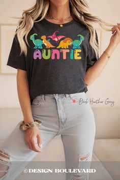 ✩ HAPPINESS GUARANTEE ✩ Be Happy or Your Money Back. Welcome to Stress Free Shopping. ✩ GET 40% OFF ✩ When you order 2 or more. Use discount code SAVE40TODAY ✩ PRODUCT ✩ Bella Canvas T-Shirts are made of ringspun cotton making them impressively soft and comfortable. (Heather colors are 52% cotton and 48% polyester) ✩ PRINTING ✩ We use DTG (Direct To Garment), an eco friendly printing process that produces vibrant and beautiful graphic tees.  ✩ PLEASE NOTE ✩ Our shirts are made to order. Because of this reason, we don't accept returns or exchanges. Please check our color and size charts carefully before placing an order.  ✩ CARE INSTRUCTIONS ✩ Turn shirt inside out. Machine wash in cold water, gentle cycle. Place in dryer on low temperature. ✩ PRODUCTION TIME ✩ ◇ 1-3 Business Days  ✩ SHIPPI Casual Tops With Cartoon Print For Birthdays, Casual Cartoon Print Tops For Birthday, Casual Tops With Cartoon Print For Birthday, Novelty Short Sleeve Tops For Birthday, Casual Cartoon Print Top For Mother's Day, Casual Tops With Cartoon Print For Mother's Day, Fun Multicolor Tops With Name Print, Cute Multicolor Tops With Funny Text, Fun Crew Neck Top For Birthday