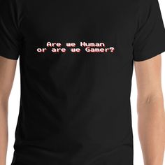 Personalize a Video Gamer T-Shirt with your favorite slang, your name, home city, or a funny phrase. Choose from 45 shirt colors, and personalize it with the text of your choice. This premium unisex t-shirt is available in XS, S, M, L, XL, 2XL, 3XL, & 4XL. It feels soft & light, with just the right amount of stretch. Black Gamer T-shirt With Letter Print, Slang Phrases, Black Gamer T-shirt With Graphic Print, Black Gamer T-shirt With Funny Text, Gamer T-shirt For Fan Merchandise With Short Sleeves, Gamer Cotton T-shirt With Logo Print, Video Game T Shirts, Jewish Star, Jewish People