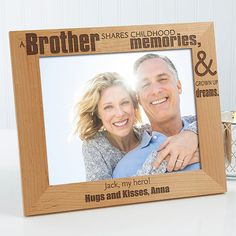 a wooden frame with an image of a man and woman