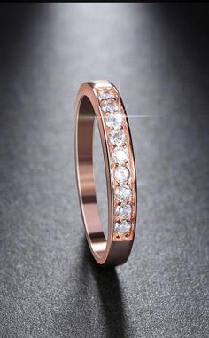 This stunning ring is sure to please! Accenting the small diamonds single cut diamonds. These diamonds are a precious The band on this marvelous ring is made with fabulous sterling silver. If you have any questions just feel free to contact me. - Brand New - High Quality - For Men & Women - Metal: Stainless Steel - Color: Rose Gold - For Wedding, Engagement or Casual - Free Shipping Sparkling Rose Gold Diamond Promise Ring, Rose Gold Sparkling Cubic Zirconia Rings, Gold Wedding Band, Crystal Rings, 925 Sterling Silver Ring, Sterling Silver Rings, Platinum, Diamond Cuts, Wedding Bands