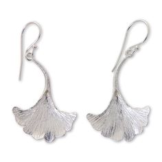 The unique shape of the oyster mushroom becomes a pair of sterling silver earrings with a textured finish. Desi Antari transforms nature's exotic beauty into earrings of exquisite artistry. Sterling silver Hook earrings Combination finish Handmade in & fairly traded from Indonesia Nickel-free Sterling Silver Nature-inspired Earrings, Nature-inspired Sterling Silver Earrings, Nature-inspired Hammered Earrings As Gift, Nickel Free Leaf-shaped Sterling Silver Earrings, Silver Leaf-shaped Jewelry With Ear Wire, Nickel Free Sterling Silver Leaf-shaped Earrings, Nickel-free Sterling Silver Leaf-shaped Earrings, Silver Drop Earrings With Nature-inspired Style, Silver Nature-inspired Drop Earrings