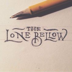 a pencil is laying on top of a piece of paper with the words, the lone below