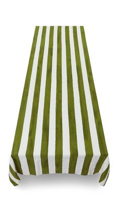 a green and white striped table cloth