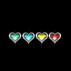 four hearts with different colors are in the shape of an arrow on a black background