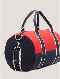 Tommy Hilfiger boys' and girls' bag.  Material: 100% Cotton. Rectangular School Duffle Bag With Adjustable Strap, Functional School Bags With Adjustable Handle, Sporty School Bag With Removable Pouch, Casual School Duffle Bag With Adjustable Strap, Navy Functional Bags For Back To School, Sporty Bags For Daily Use And Back To School, Casual Canvas Duffle Bag For School, Sporty Shoulder Bag With Removable Pouch For School, Casual School Travel Bag With Adjustable Strap