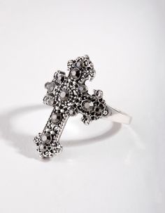 Description
This vintage-inspired statement ring is sure to make you feel like you're from a better era. This ring is made from antique silver and features a diamante-embellished cross. Pair with an evening dress for a considered look. Ring With Cross, Piercings Nose, Sterling Silver Opal Ring, Goth Accessories, Fashion Jewellery Online, Silver Opal Ring, Nose Piercings, Jewelry Tattoo, Bold Earrings